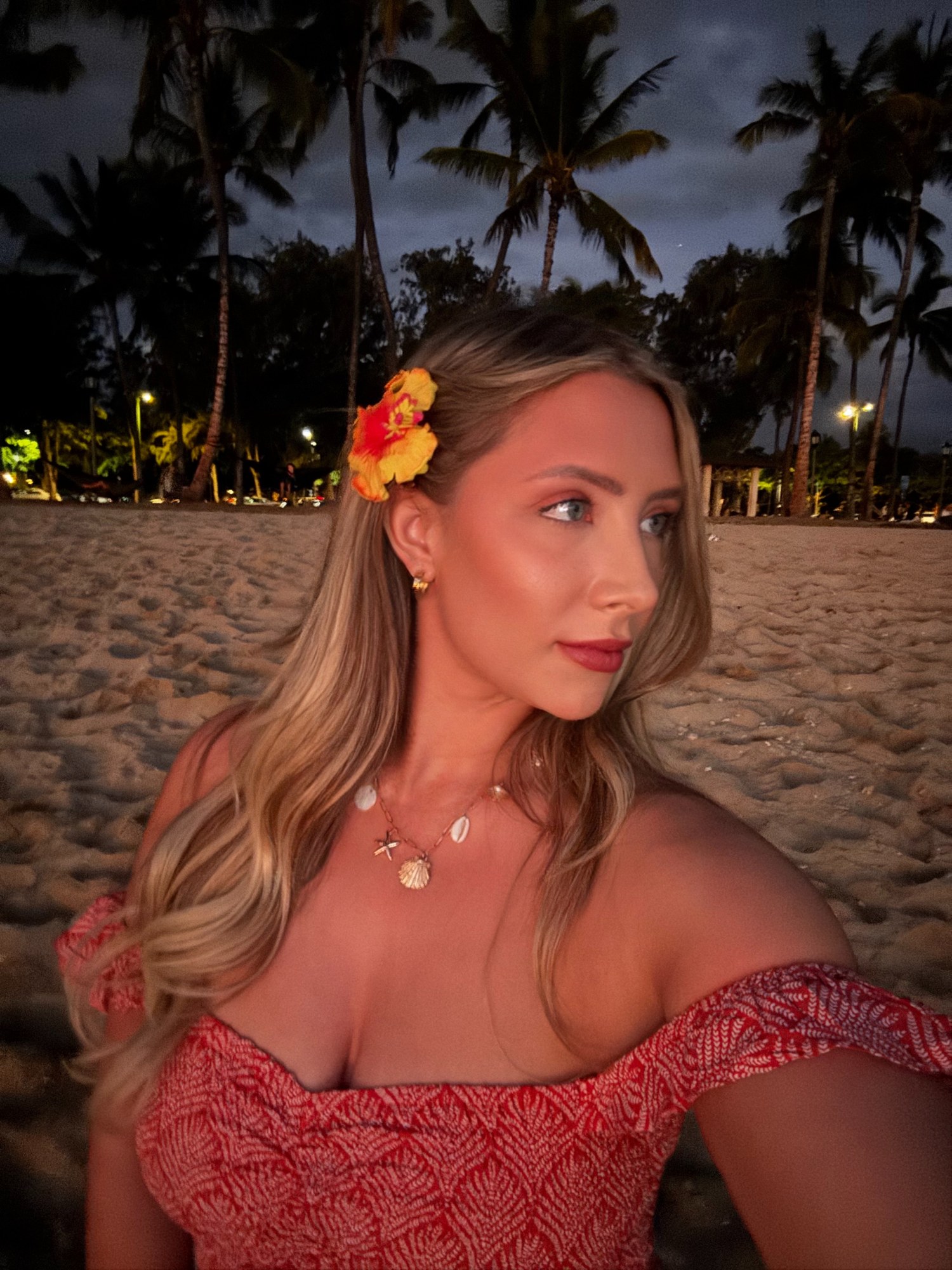 Kaila Czar on the beach at night
